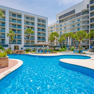 Relaxing by the pool is a must while here on vacation