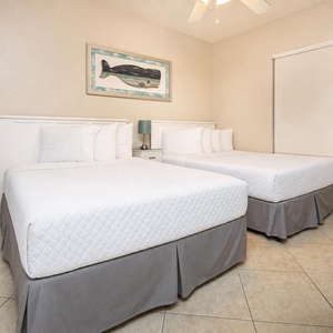 Rest comfortably in this inviting guest room with two double beds, tasteful decor, and a relaxing atmosphere for your stay