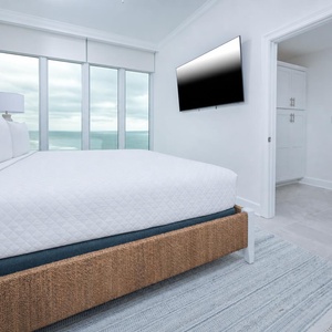 Experience the beautiful colors of a gulf coast sunrise from this king guest suite