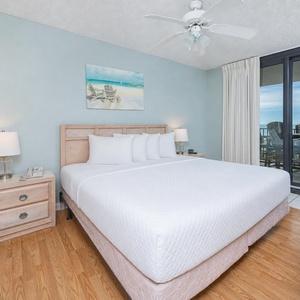 Experience serenity in the king master suite, where soft bedding awaits and coastal views welcome your arrival