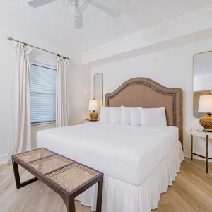 Drift into a tranquil sleep enveloped by soft bedding and the calming vibe in this king guest suite