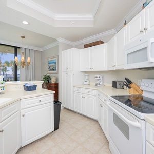 Experience delightful cooking moments in the bright kitchen while enjoying views of the beautiful bay
