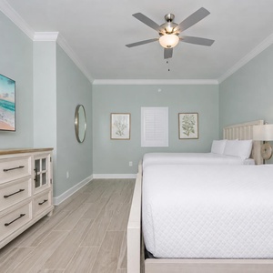 Unwind after a day at the beach with your favorite show in this peaceful queen guest room