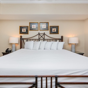 Unwind after a day at the beach in this elegant king master suite surrounded by stylish coastal accents