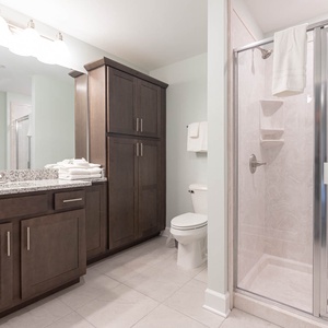 Refresh your morning in the guest bath with a relaxing walk-in shower to start your day