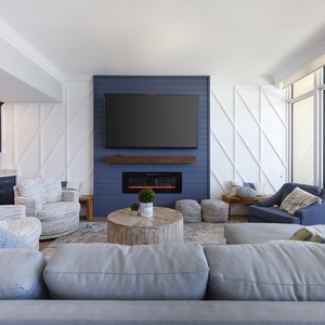 Relax on the cozy sofa with a queen sleeper in this inviting family room with breathtaking beachfront views