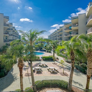 Discover the pool area with a refreshing lazy river and thrilling waterslide, just steps from the bay