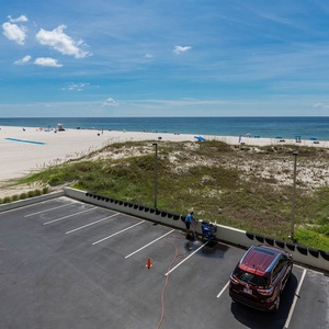 Enjoy stunning beachfront views from this inviting space, perfect for relaxation and fun in the sun