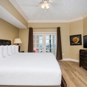 Enjoy restful nights in this king master suite with cozy bedding and drift off into a peaceful slumber