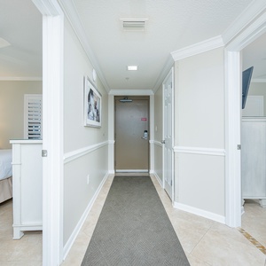 Welcoming entryway to your beachfront vacation retreat with views into the inviting king guest suites