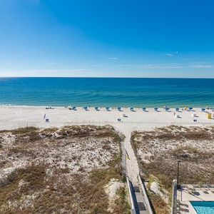 Enjoy breathtaking beachfront views from this inviting space, perfect for relaxation and soaking up the sun