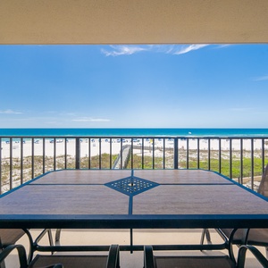 Shadows cool your skin while you gather around the table and hear waves rolling onto the shore