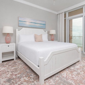 Imagine waking in this king master suite, walking to glass doors, and watching the gulf and beach from the balcony