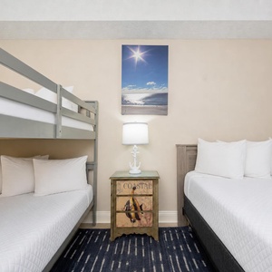 Rest comfortably in this cozy guest room, where the full bunk beds and a double bed provide a perfect retreat