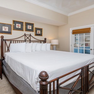 Drift into comfort in the king master suite, surrounded by serene decor and ready for restful nights on the beach