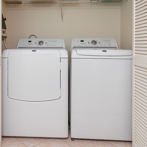 Conveniently do laundry with a washer and dryer tucked away in the utility closet for your comfort during your stay