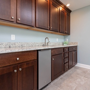 Mix drinks or store chilled beverages at the convenient wet bar, adding a refreshing touch to your getaway