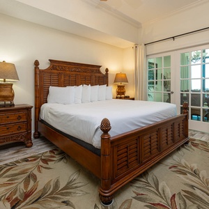 Unwind after a day at the beach in this elegant king master suite surrounded by stylish accents