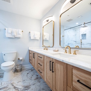 Pamper yourself with a refreshing rinse in the master bath shower, surrounded by elegant finishes and soothing colors