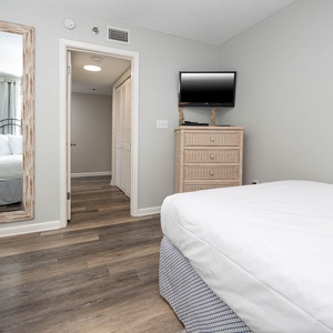 Relax in this cozy guest bedroom featuring two double beds and a TV