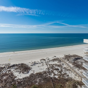 Enjoy breathtaking views of the tranquil waters and shoreline from your spacious balcony