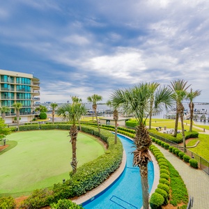 Enjoy stunning views of the bay and marina from your balcony and relax with lush landscaping