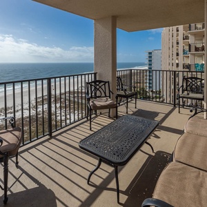 Relax on the spacious balcony enjoying refreshing breezes and stunning views of the coastline