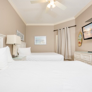 Unwind in this queen guest suite and stream your favorite shows or enjoy a good movie after a beach day