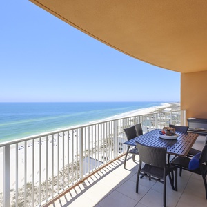 Gather at the balcony table, breathe gulf air, and watch the coastline and beach unfold below