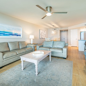 Gather on plush seating to chat, while enjoying the warm vibe and gentle breezes from your balcony