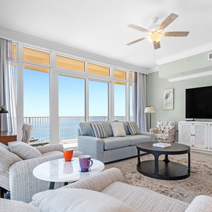 Enjoy your morning coffee with beautiful beach sunrises in this inviting family room