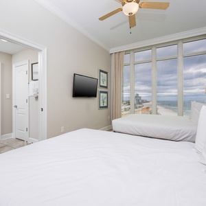 Nestle into one of the queens in this guest suite while enjoying coastal views from your serene retreat