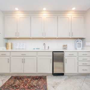 Grab a chilled drink from the fridge or create your favorite cocktail at the wet bar