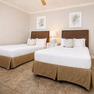 Relax in the inviting queen beds in the guest suite, perfect for unwinding after a day of beach adventures