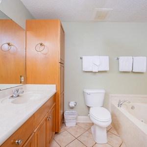 Refresh in the master bath after a day of adventure with a soothing jetted tub and relaxing walk-in shower