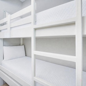 Bunk beds in the hallway offer a cozy spot for the kids after fun-filled days along the coast