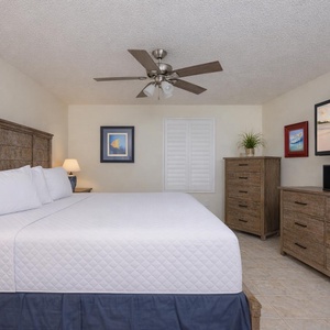 Drift into relaxation surrounded by soothing decor and plush bedding, perfect for restful nights at your beach retreat