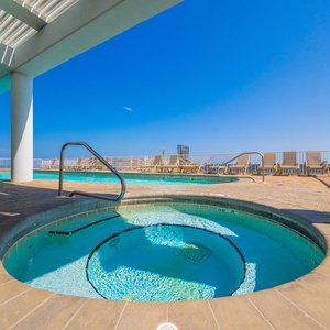Unwind and soak in the relaxing hot tub after a day at the beach