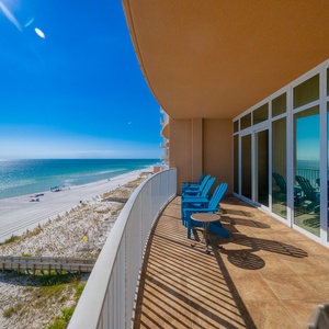 Relax on your spacious balcony, enjoying sweeping views of the sparkling and seemingly endless shoreline