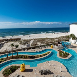 Experience stunning third floor views from your balcony overlooking the pool area and beautiful coastline