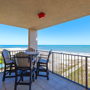 Savor meals on the balcony while enjoying tranquil views of the coastline and gentle waves