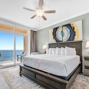 Feel the gulf breeze as you drift off on the plush king bed in this elegant master suite