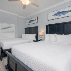 Relax in comfort in this guest suite with two queens, surrounded by serene decor that invites restful nights