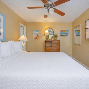Relax on the soft king bed in this guest suite, streaming your favorite shows while surrounded by charming coastal decor