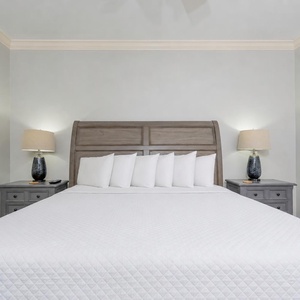 This guest suite invites you to sink into crisp linens and enjoy restful quiet before morning begins