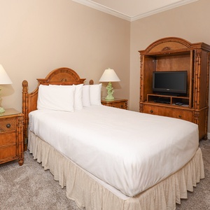 Retreat to this queen guest suite, where laughter and restful nights fuel your beachside adventures