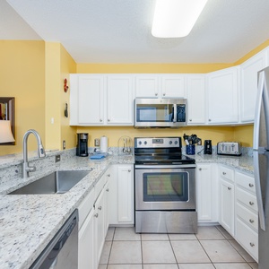 Lovely updated kitchen with stainless appliances and inset large sink is perfect for preparing meals during your stay