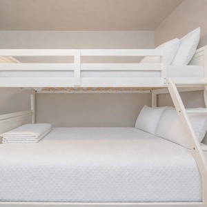 Sleep soundly in the guest suite's cozy twin over full bunk bed with soft pillows and gentle coastal colors