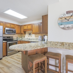 Gather your family around the breakfast bar, perfect for sharing laughter and stories while preparing meals