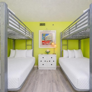 Experience laughter and fun in this playful bunk room, perfect for cozy family sleepovers and movie nights